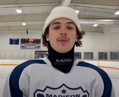 Hockey player wearing a Skate Armor Hockey Neck Guard demostration.jpg